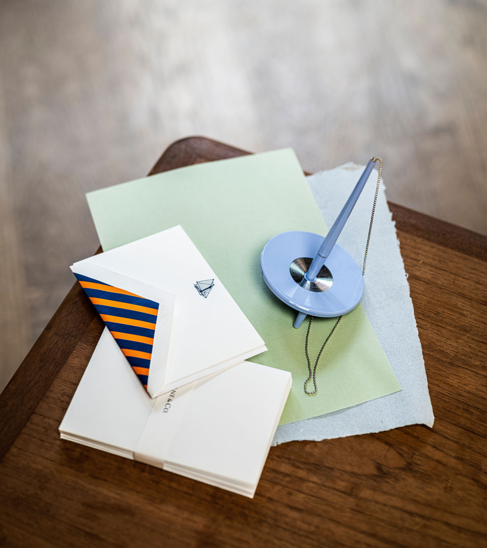 Paper, envelopes and a stationery pen
