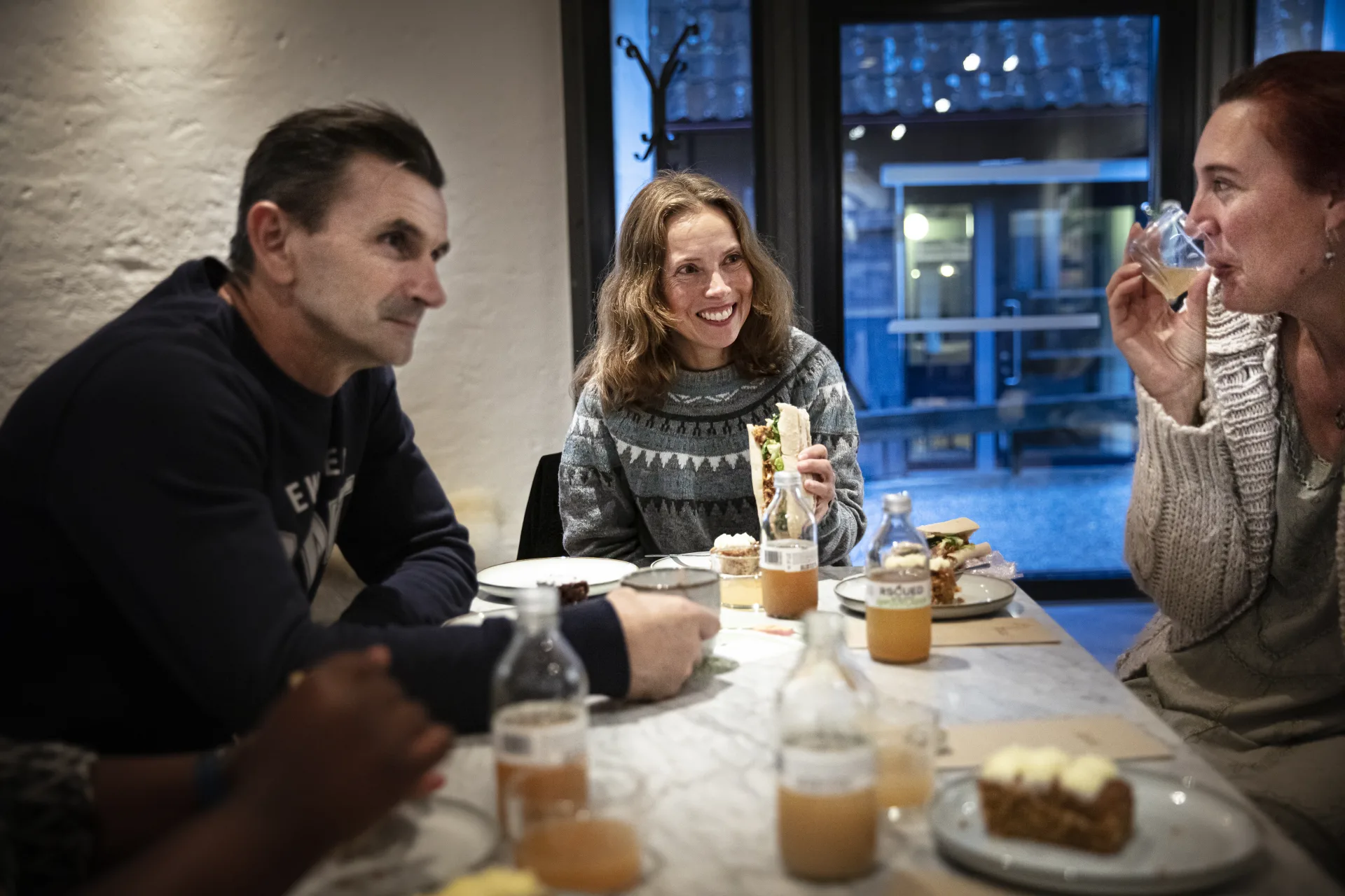 People drinking coffee outdoors