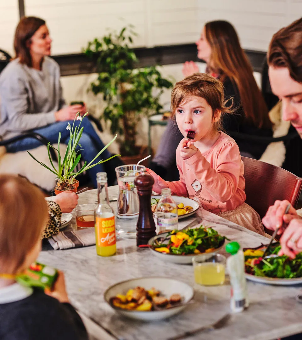 Image of child eating in the restaurant